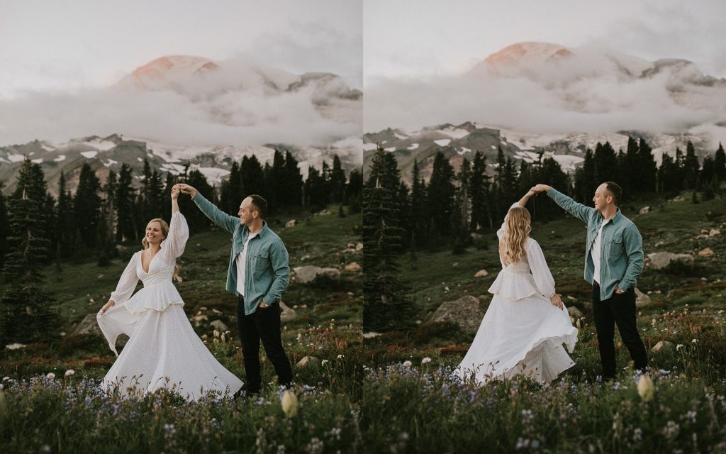 bride and groom twirling at mountain wedding