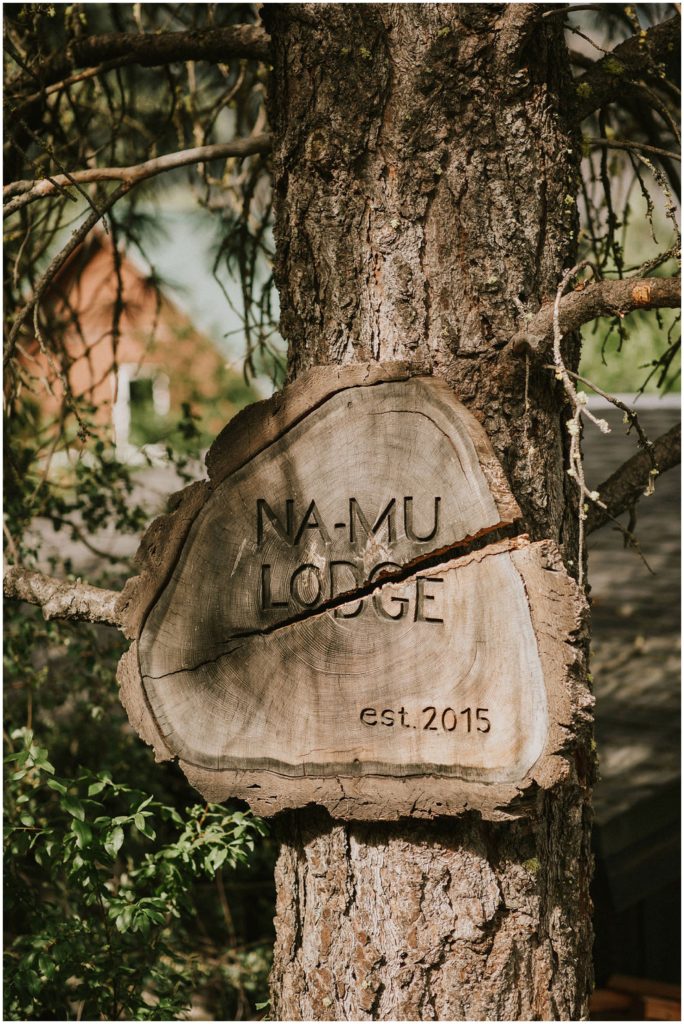 lodge sign in tree
